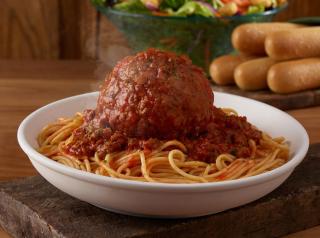 A 12-ounce Giant Meatball with Spaghetti at Olive Garden.
